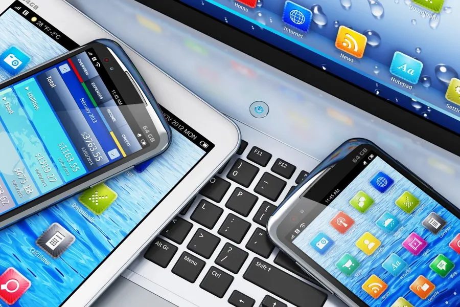 Smartphones, a tablet and a laptop ready for forensic examination
